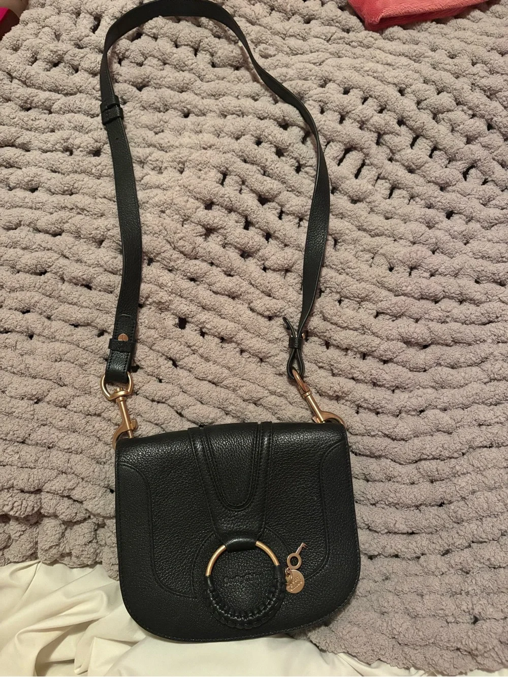 See By Chloe Black mini Hana Leather Saddle Crossbody with Gold Ring Detail